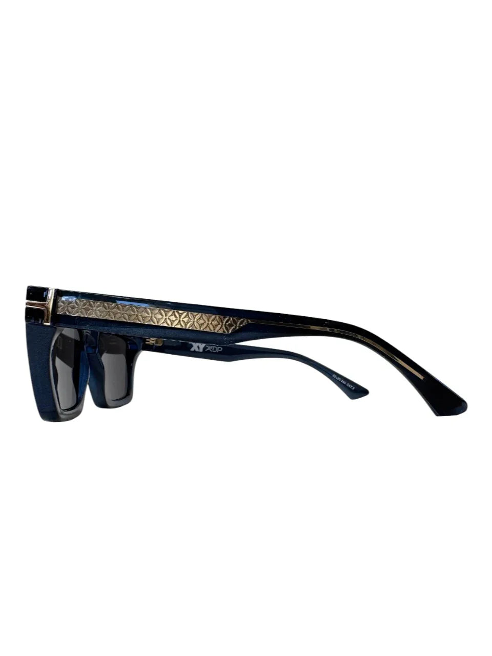 Blue designer sunglasses with gold geometric detail on the temple, side view on white